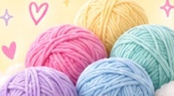 A pile of colorful yarn balls